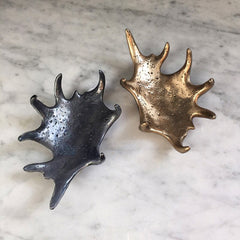 solid bronze antler dish, shown in 2 finishes: blackened and satin