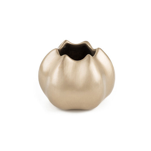 Solid bronze vessel shownin satin finish; looks like a very smooth barnacle