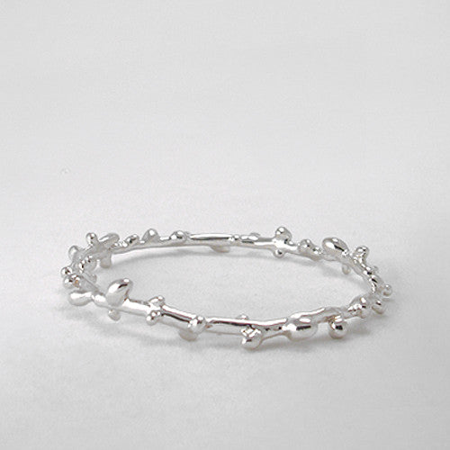 Polished silver bandle in shape of cherry blossom branch