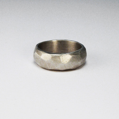 Heavy, faceted, domed band; shown in silver