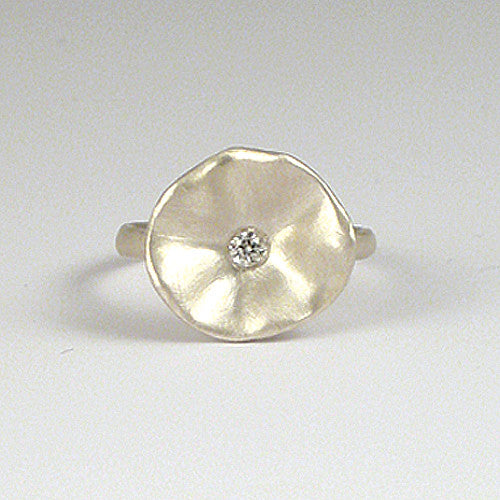 Soft, wide flower ring, with center diamond and rolling hill-like inner shape