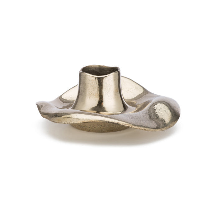 Low, taper candle holder in cast bronze with flared, ruffled, skirt-like design