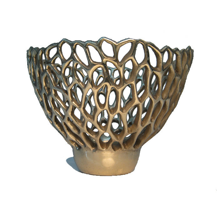 Footed bowl with lacy design of nagative space