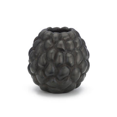 small, candle holder with bumpy textures like annona fruit; shown in blackened finish