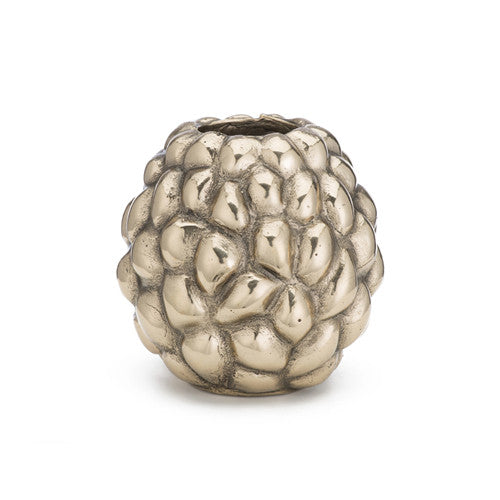 small, candle holder with bumpy textures like annona fruit; shown in polished finish