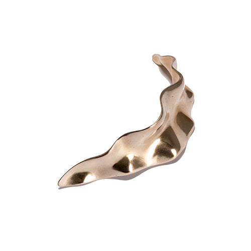 Curved, ruffled leaf-like letter opener in polished bronze