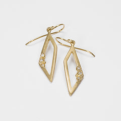Outline of trapezoid; 3 diamond buds; earring on wire; shown in yellow gold