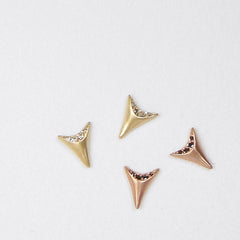 mini tooth-shaped stud with 4 stones set in crescent-shaped portion at top of earring