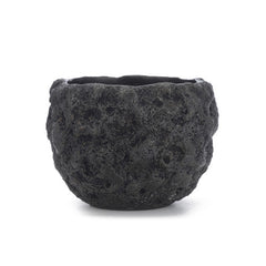 Bowl with heavily textured exterior with protrusions and valleys, and smooth, polished interior; shown in blackened finish