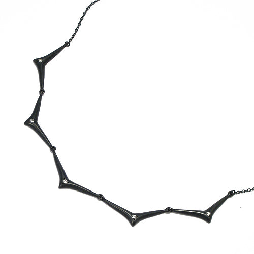 Necklace comprised of 5 components connected to each other and to chain, forming a collar of soft, elongated, stylized thorny branches, each with a center diamonds