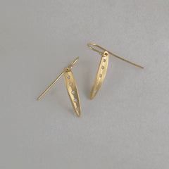 Very small, narrow leaf earring on wire; shape is slightly convex with vertical crease in center; shown in yellow gold; 5 diamonds run up an down crease